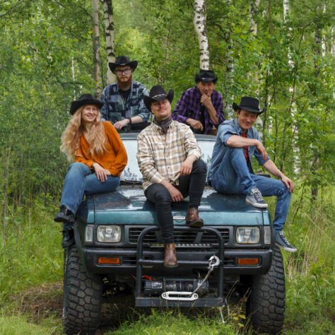 Grainville Train Rev Up the Road With “Cowboy Cadillac”